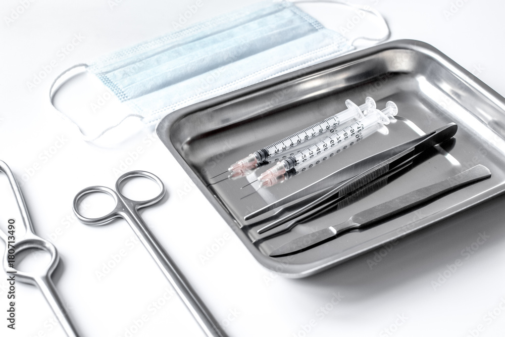 instruments for plastic surgery on white background instruments for plastic surgery on white background