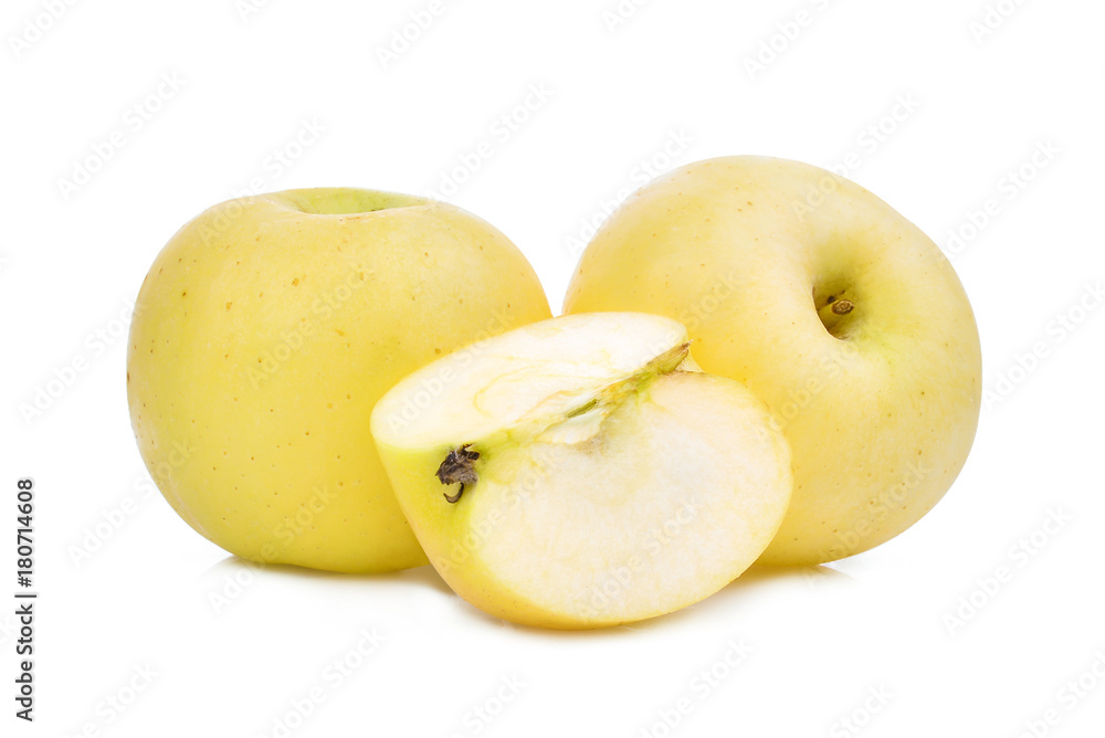two whole and slice of golden or yellow apple fruit isolated on white background