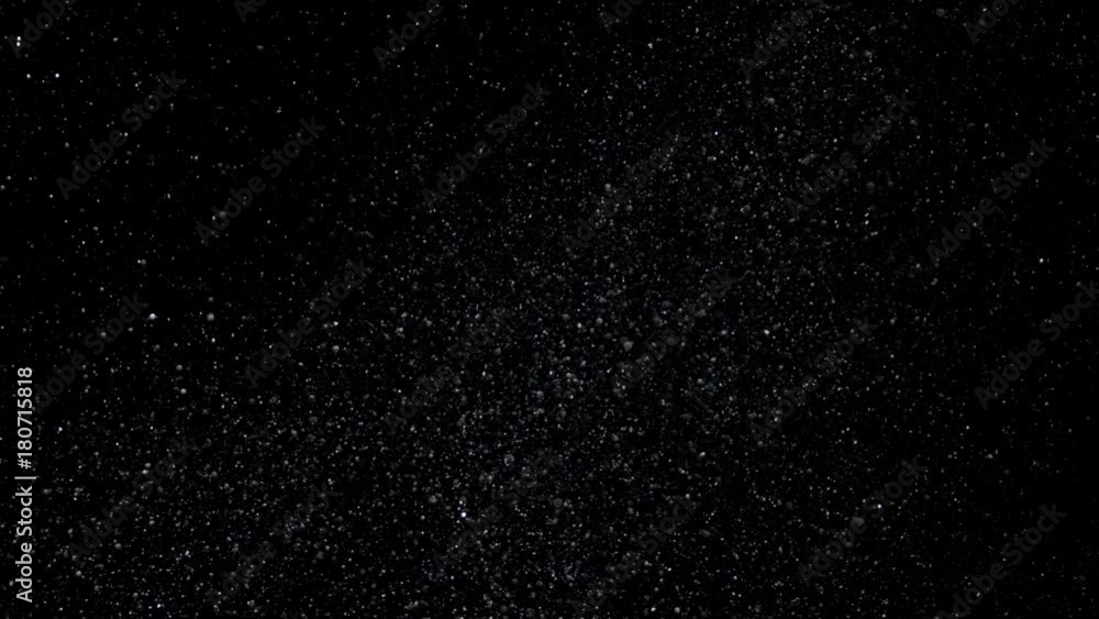 Slow Motion Snowfall Bokeh Lights on Black Background, Shot of Flying Snowflakes in the Air Slow Motion Snowfall Bokeh Lights on Black Background, Shot of Flying Snowflakes in the Air