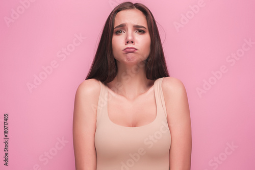 The young woman's portrait with sad emotions