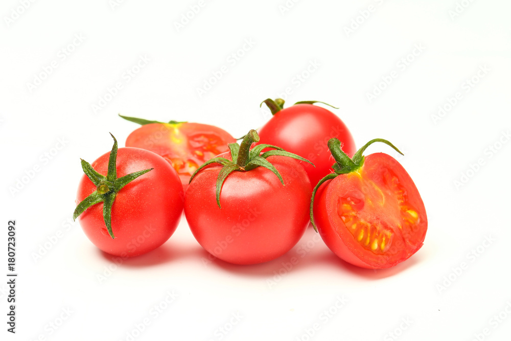 small tomatoes isolated on white background small tomatoes isolated on white background