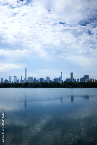 New York skyline and reflection on Jackie Onassis reservoir in Central Park, Manhattan, New York