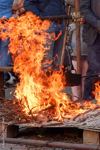 Cooking chestnuts on burning coals