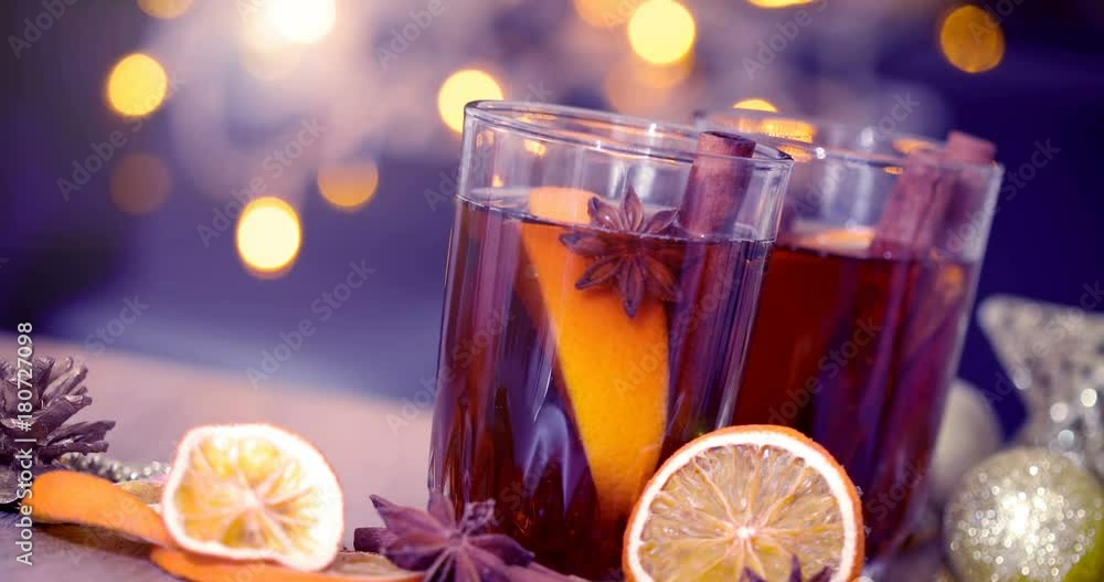 Mulled wine in night celebration of New Year party and delicious Christmas drink for autumn and winter season , vintage color tone Mulled wine in night celebration of New Year party and delicious Christmas drink for autumn and winter season , vintage color tone