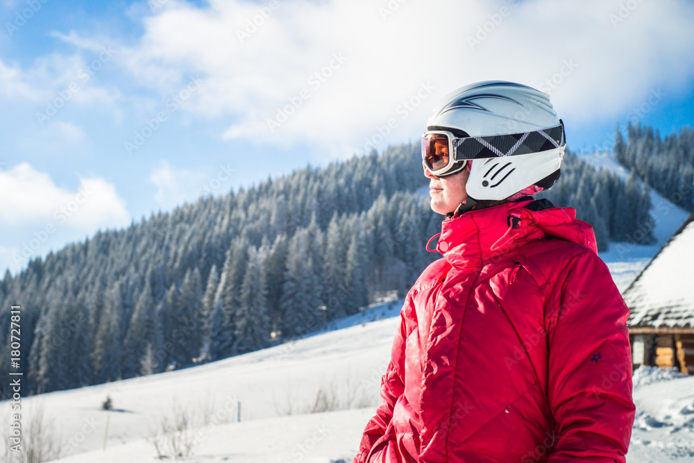 Woman skier on a ski slope Woman skier on a ski slope