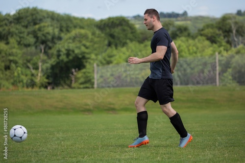 Player practicing football in the ground © wavebreak3