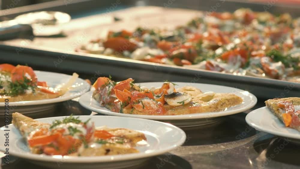 Many portions of fresh pizza Many portions of fresh pizza