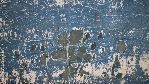 Muro azul manchas pretas e brancas com rachaduras