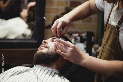 the man is sheared in barbershop