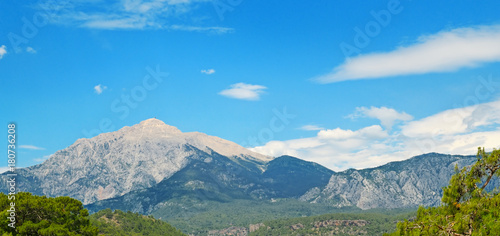 Fototapeta Naklejka Na Ścianę i Meble -  The top of the mountain Olympos (Turkey) against the blue sky