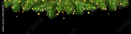 Green pine twigs and golden...