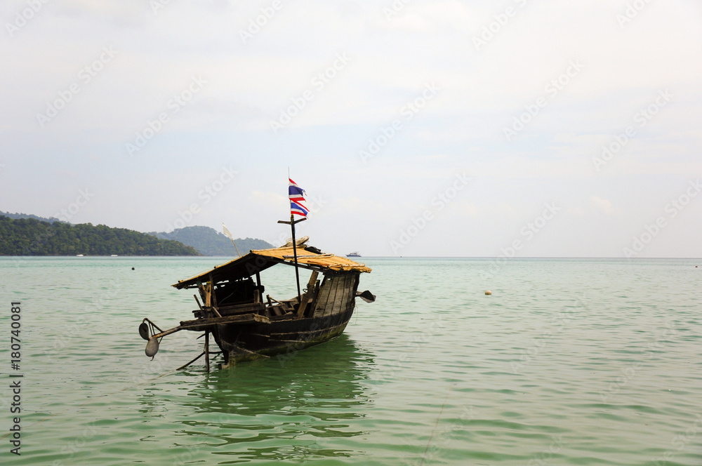 Local fishing boats are floating in the sea, Moken tribe