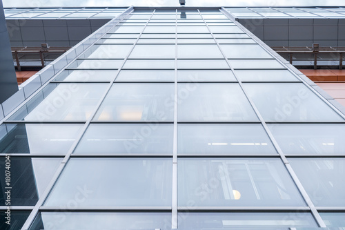 Fotótapéta Close-up multi-storey office building with mirror windows