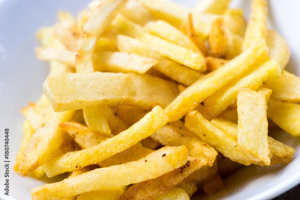 Golden French fries potatoes ready to be eaten Golden French fries potatoes ready to be eaten