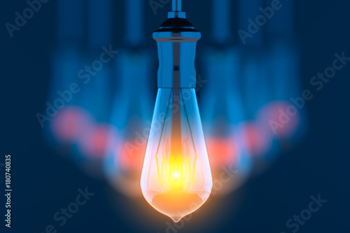 Glowing lightbulbs on blue background