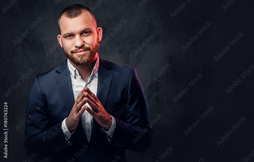 A man dressed in an elegant blue evening suit. A man dressed in an elegant blue evening suit.