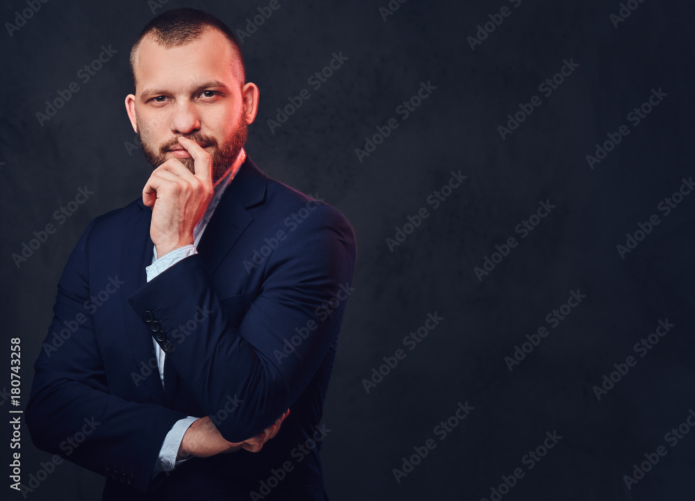 A man dressed in an elegant blue evening suit. A man dressed in an elegant blue evening suit.