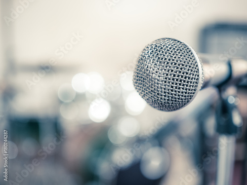 Single microphone on classical light background to performance the great show of world music.