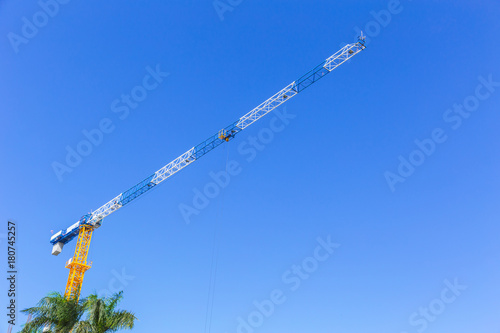 construction crain on clear blue sky photo