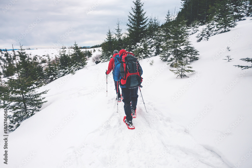 Two climbers in the winter.