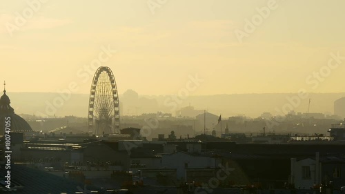 sunset paris city famous galeries lafayette rooftop cityscape ferris wheel panorama 4k france
 photo