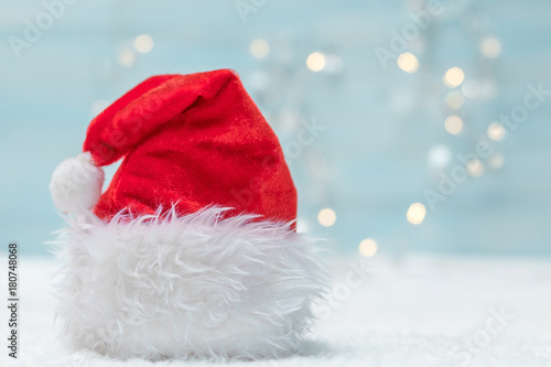 Holiday background with Santa Claus hat