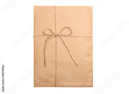 Envelope kraft paper tied with string on a white background