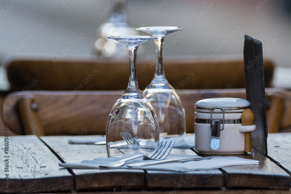 Empty wine glasses on the table served for lunch, dinner in cafe, restaurant outside or on terrase Empty wine glasses on the table served for lunch, dinner in cafe, restaurant outside or on terrase
