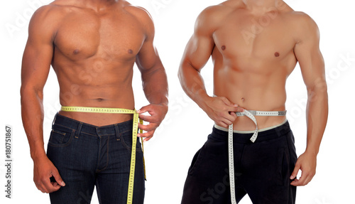 Two male bodies with tape measure photo