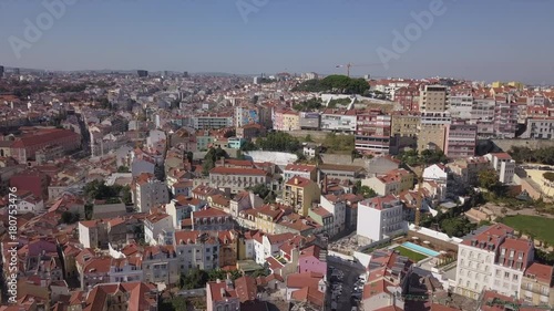 day time lisbon cityscape alfama quarter rooftops aerial panorama 4k portugal
