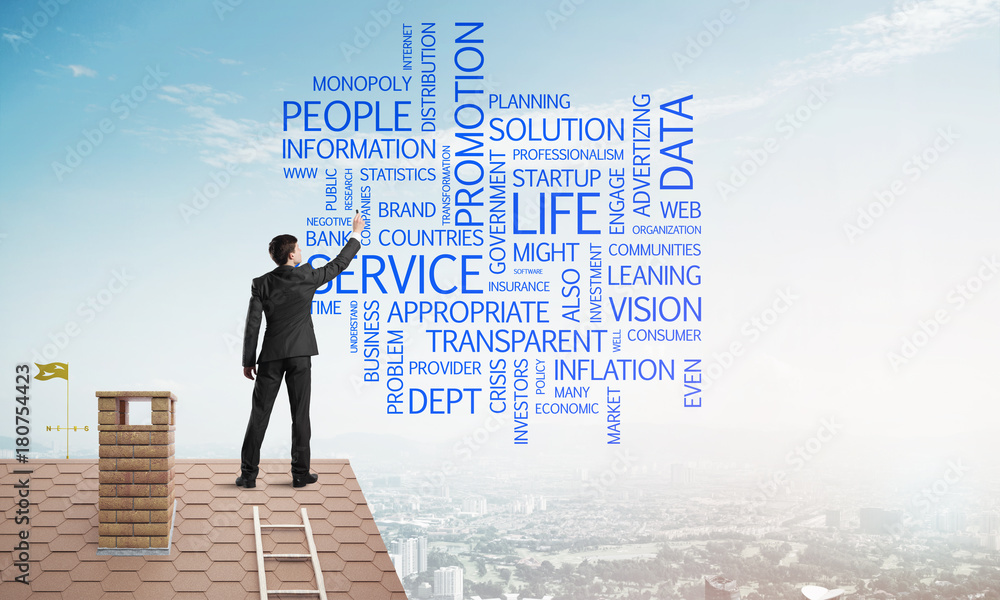 Young businessman standing on house roof and writing leadership skill concept. Mixed media Young businessman standing on house roof and writing leadership skill concept. Mixed media