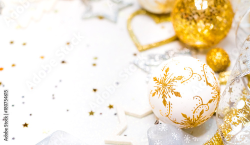 abstract christmas decor in gold and white caves with christmas toys