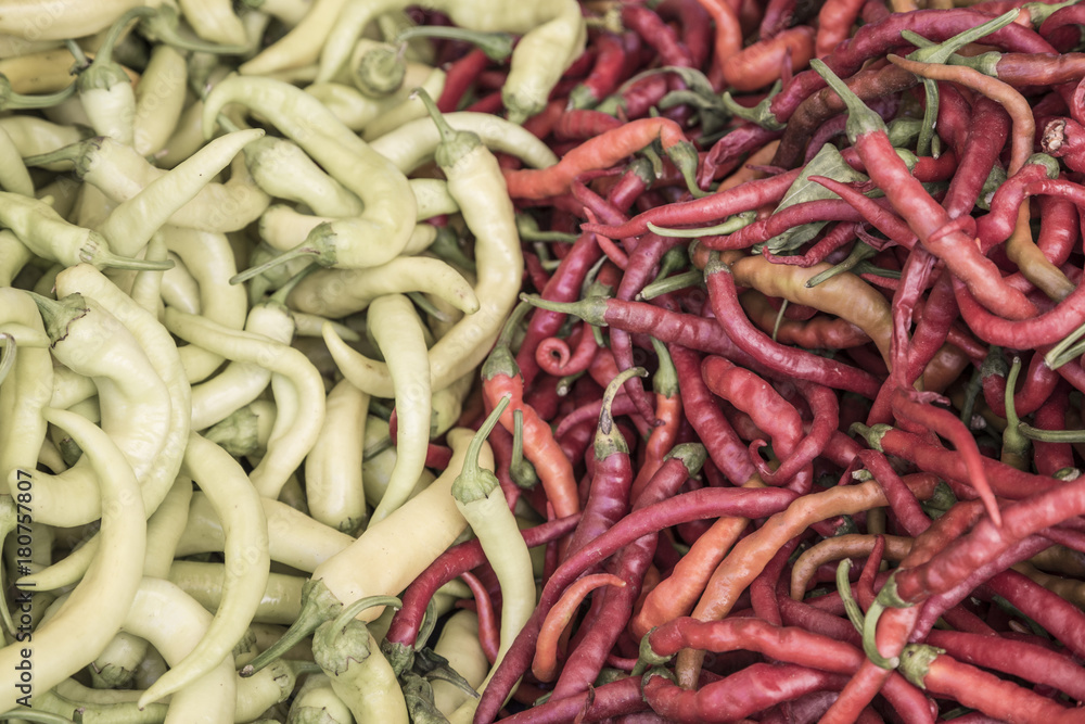 green and red peppers as a background green and red peppers as a background