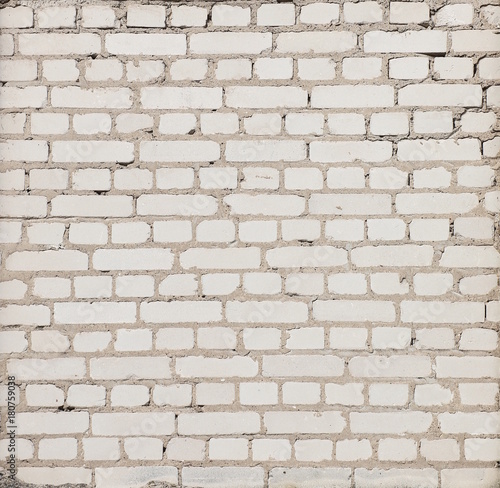 Simple gray brick wall with mortar usable as texture