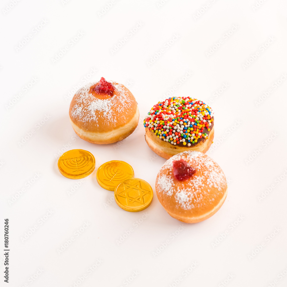 Fresh donuts for Hanukkah celebration. Selective focus. Fresh donuts for Hanukkah celebration. Selective focus.