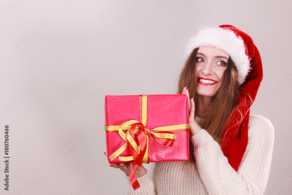 Woman holding gift box. Christmas time Woman holding gift box. Christmas time