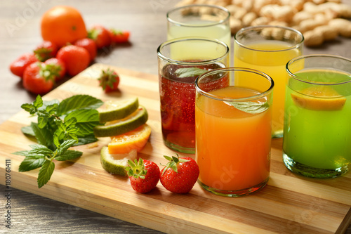assorted fruit juices with ingredients around