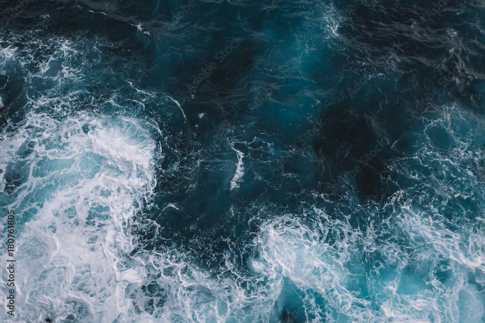 Aerial view to ocean waves. Blue water background - obrazy, fototapety, plakaty 