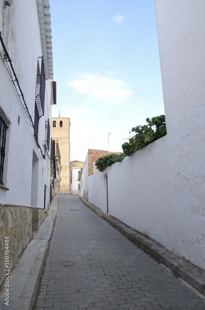 Street ending at bell tower in Belmonte, Cuenca, Spain