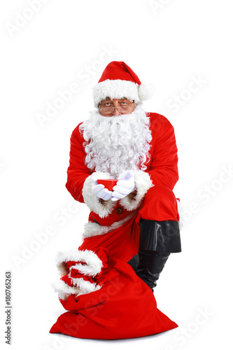 Santa Claus with Christmas Gift, isolated on white background