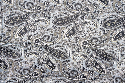 Obraz na płótnie Gray background with ornament texture of clothes. w salonie