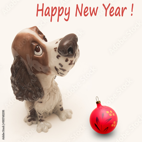 Dog toy and Christmas toy on white background with Happy New Year  inscription