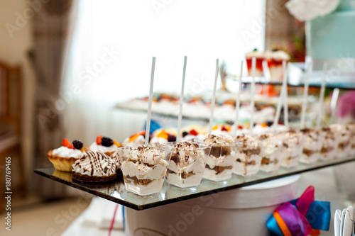 Delicious wedding reception candy bar dessert table © olexandra