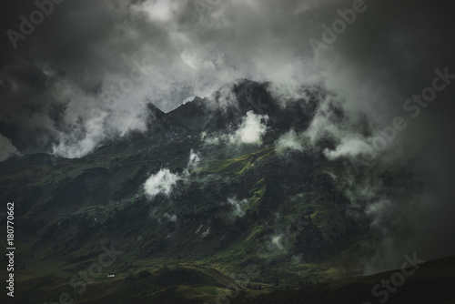 Dark, cloud shrouded landscape and mountain range © XtravaganT