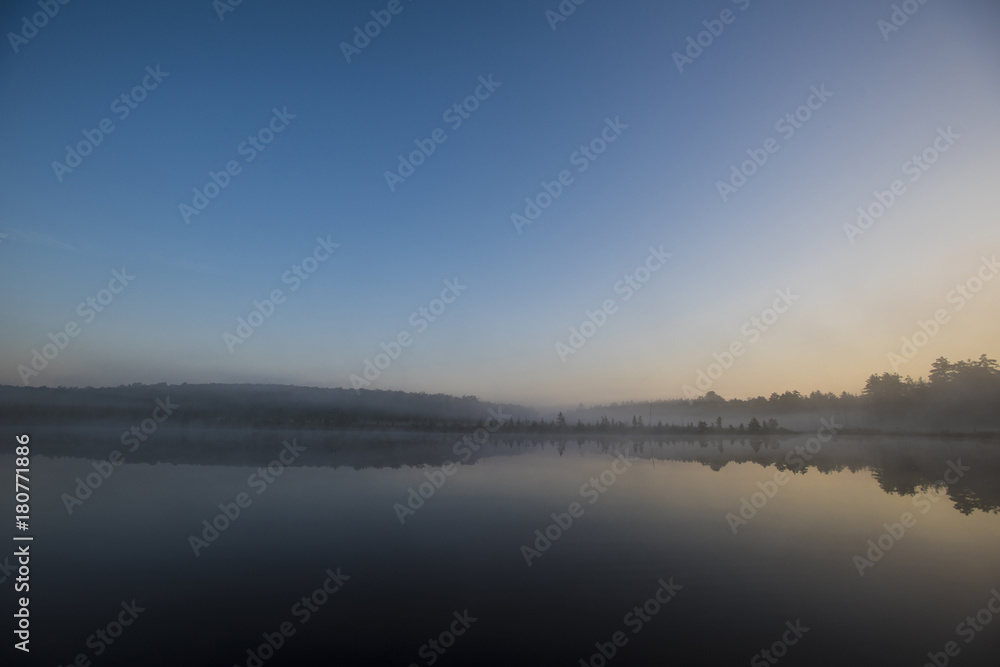 Fototapeta premium Morning fog on a Quiet Lake