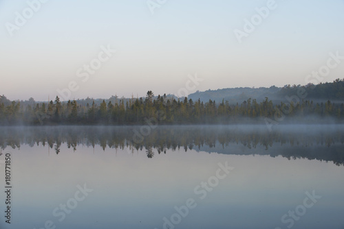 Morning fog on a Quiet Lake