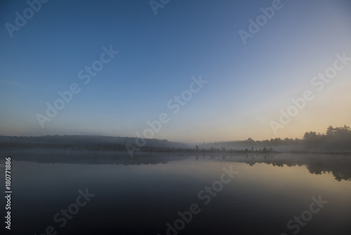 Morning fog on a Quiet Lake © hsun337