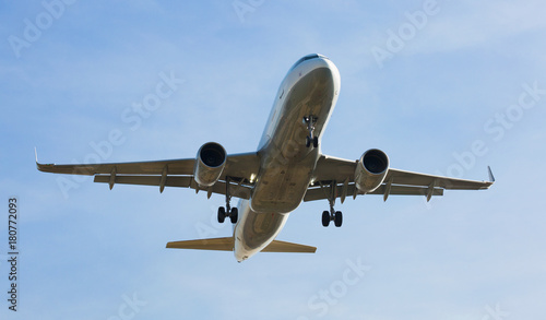 Passenger plane departing in afternoon