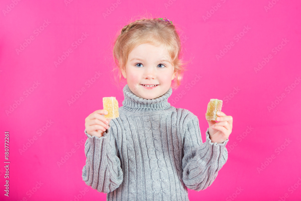Beautiful little happy girl with candy Beautiful little happy girl with candy