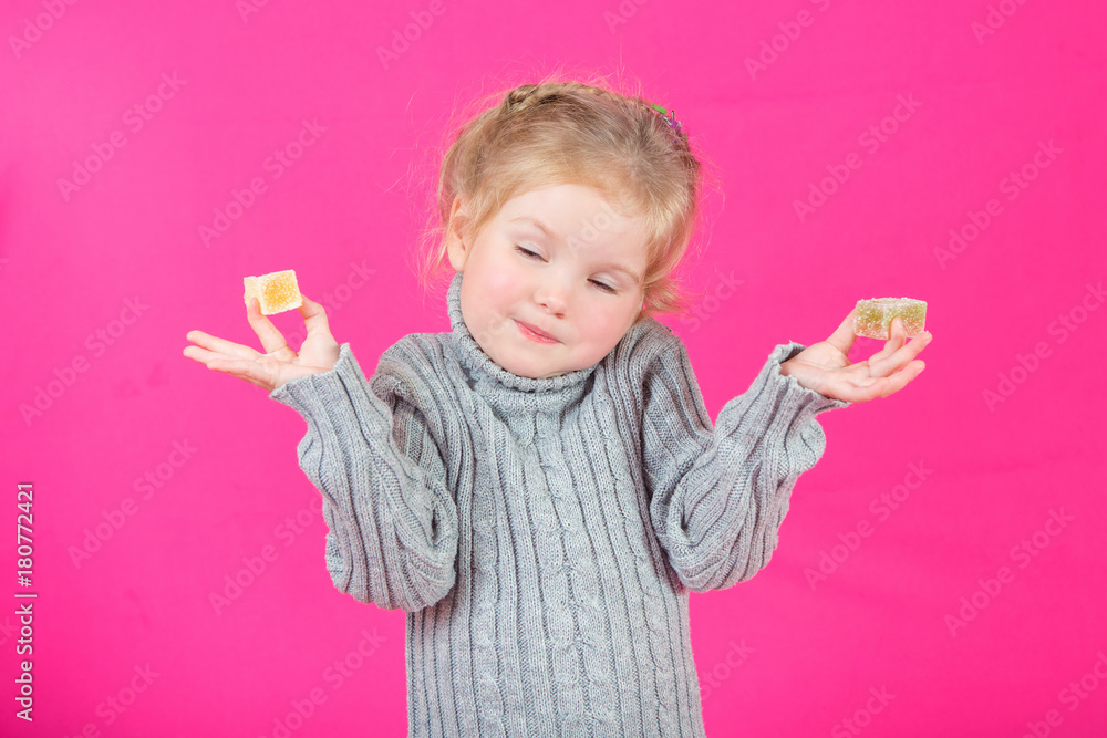 Beautiful little happy girl with candy Beautiful little happy girl with candy